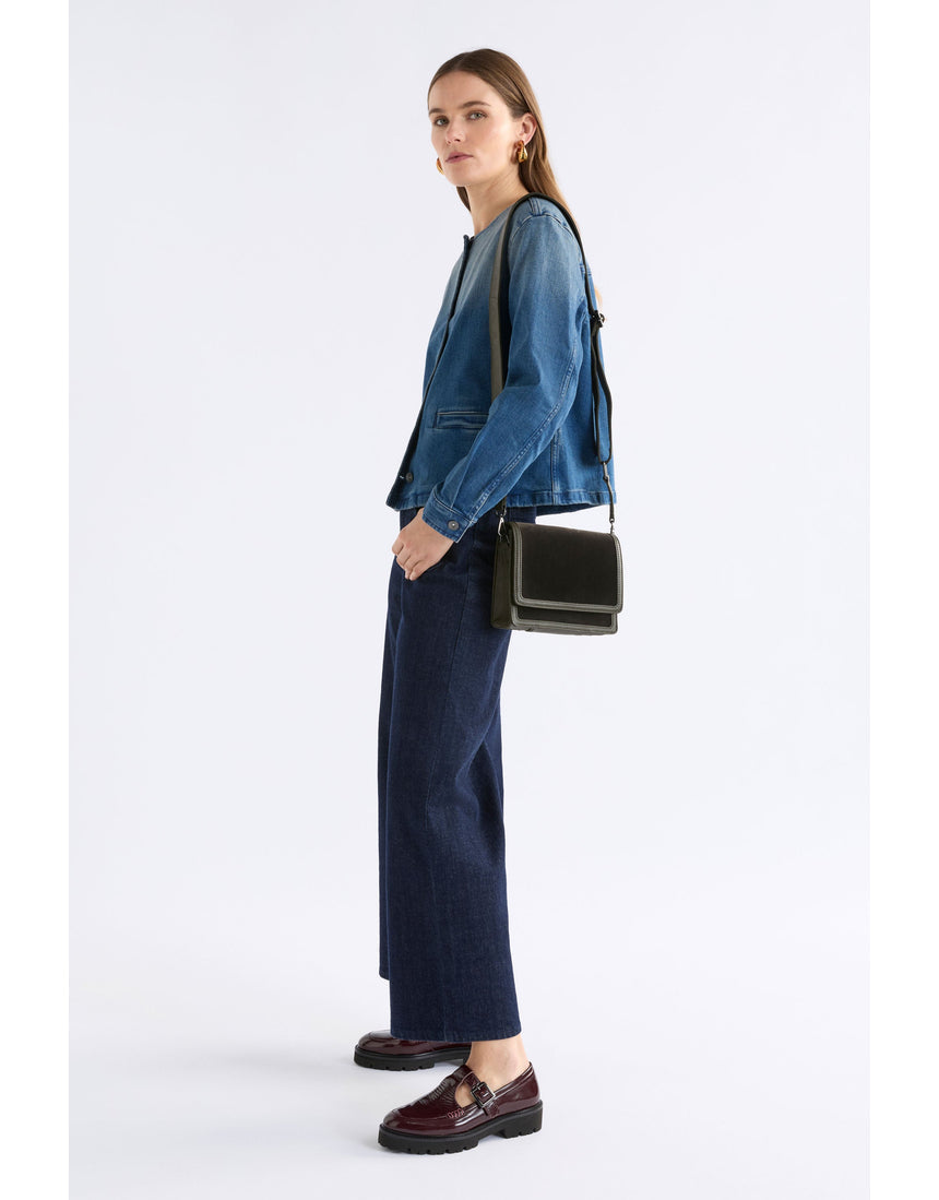 Dark olive ELK The Label Vel crossbody bag with adjustable strap and sleek design, shown with zipper closure and compact shape.