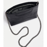 Black Elk Elsmar crossbody bag by ELK The Label, featuring a sleek design with a front flap and adjustable strap.
