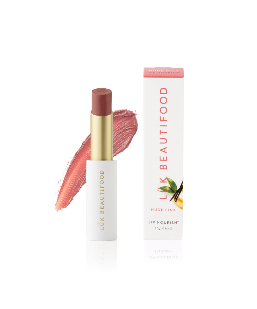 Luk Beautifood Lip Nourish lipstick in Nude Pink, showing the sleek tube and the soft pink shade inside.