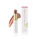 Luk Beautifood Lip Nourish lipstick in Rose Lime shade, featuring a sleek lipstick tube with the product name and rose-colored packaging.