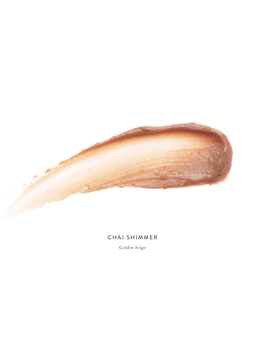 Lük Beautifood Lip Nourish Chai Shimmer lipstick in a warm, shimmering brown shade, with sleek packaging and natural finish.