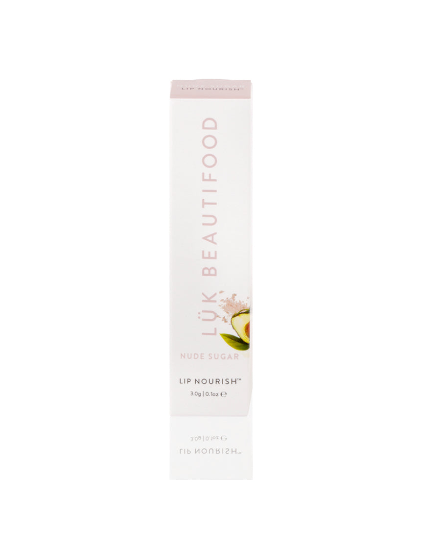Luk Beautifood Lip Nourish lipstick in Nude Sugar, showing the sleek packaging and the nude shade of the product.