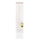 Luk Beautifood Lip Nourish lipstick in Nude Sugar, showing the sleek packaging and the nude shade of the product.