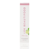 Luk Beautifood Lip Nourish lipstick in Rose Lime shade, showing the sleek packaging and product color.