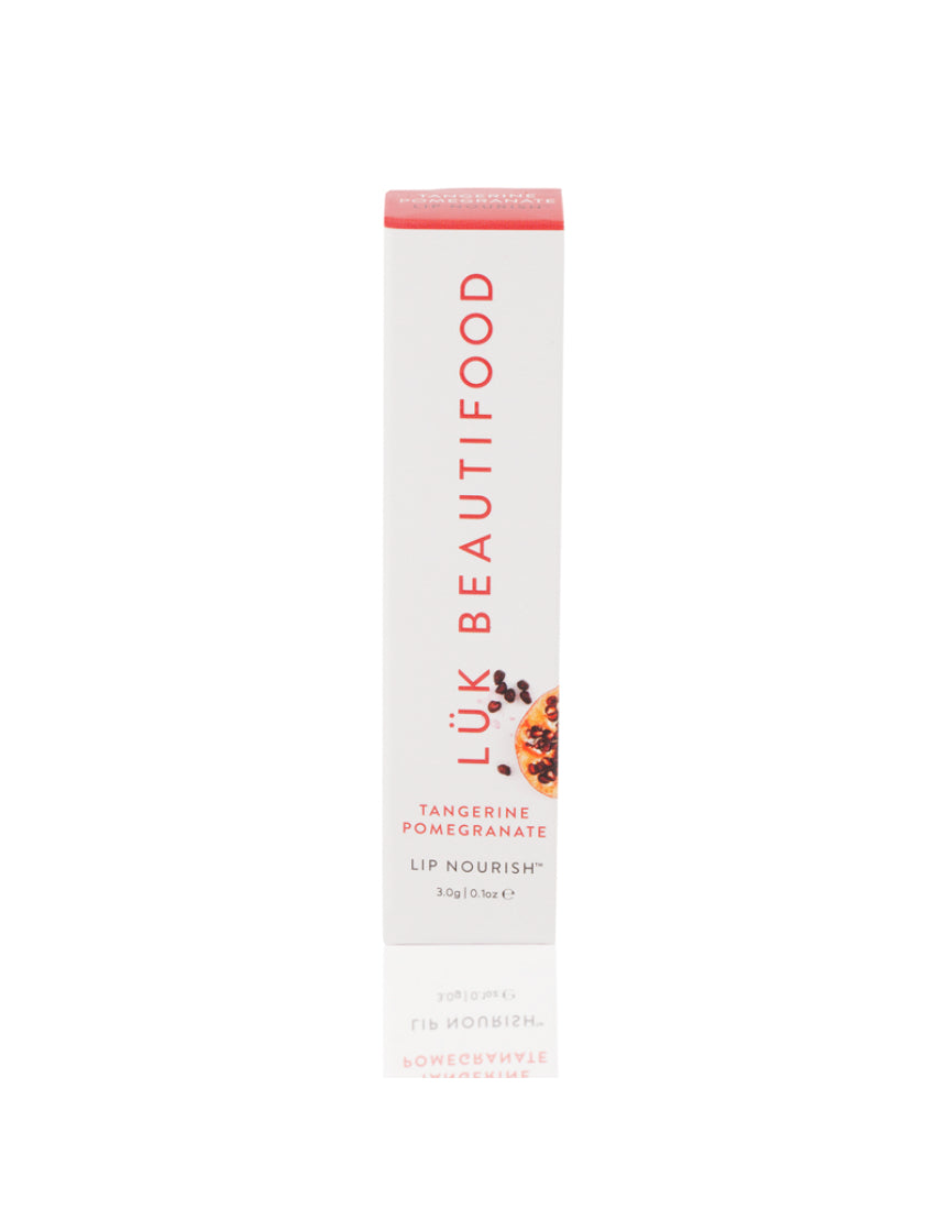 Luk Beautifood Lip Nourish lipstick in Tangerine Pomegranate with natural ingredients and vibrant orange packaging.