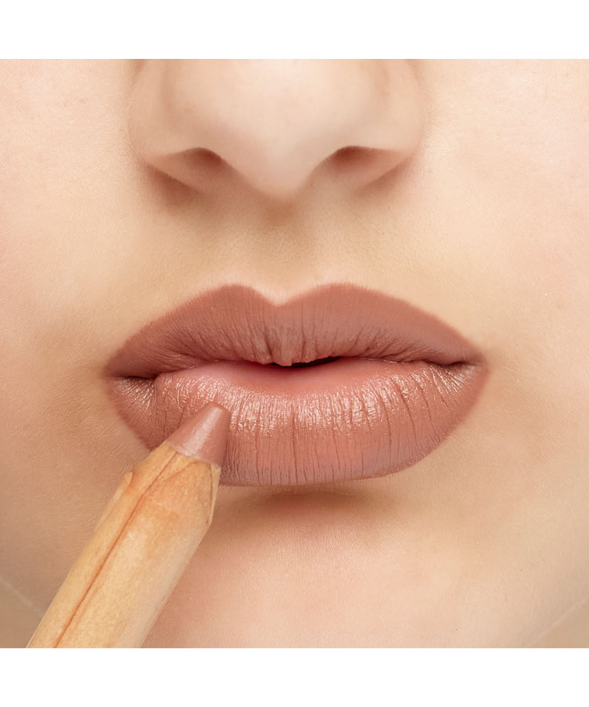 Luk Beautifood Natural Lipstick Crayon in Fig Brûlée applied on lips, showcasing smooth, creamy lipstick texture.