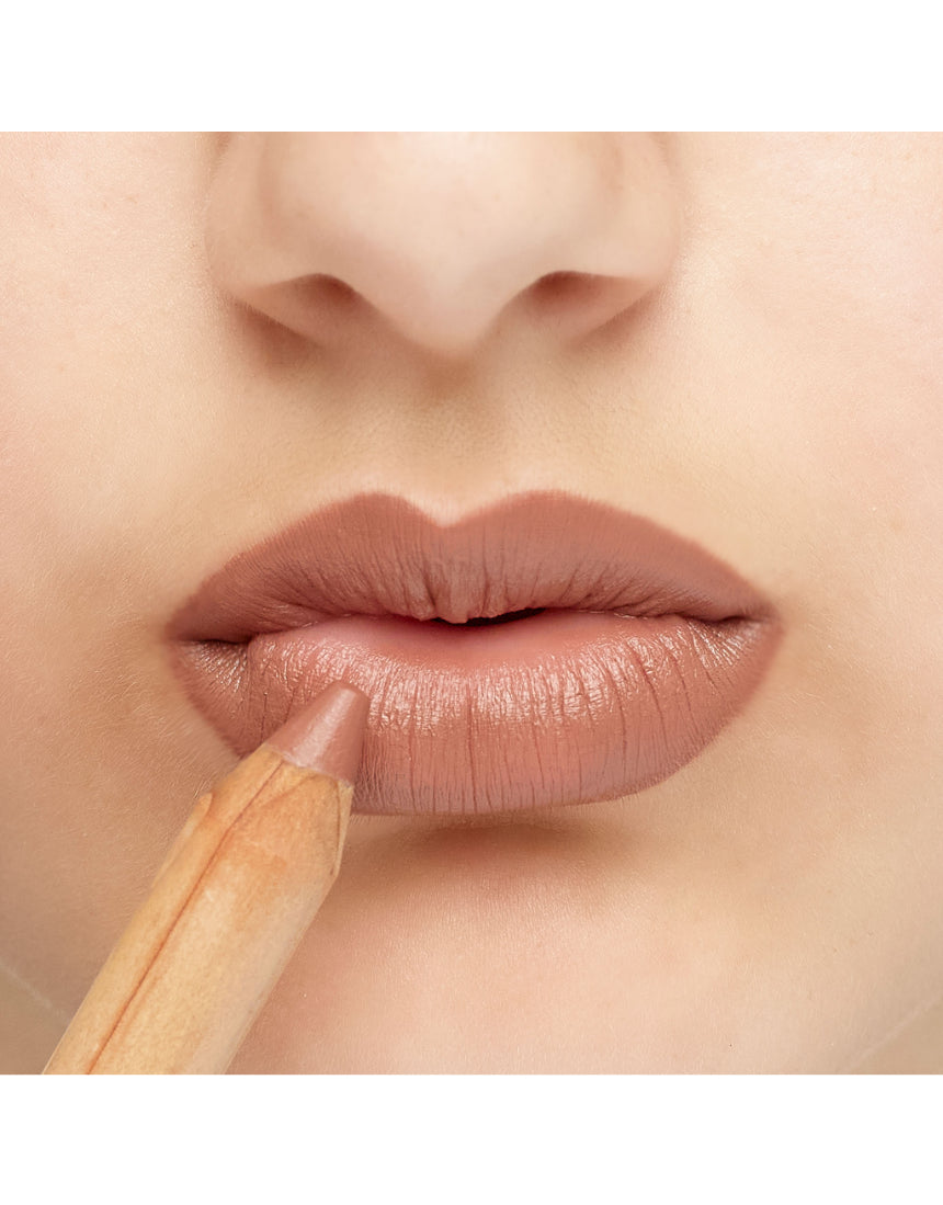 Luk Beautifood Natural Lipstick Crayon in Fig Brûlée applied on lips, showcasing smooth, creamy lipstick texture.