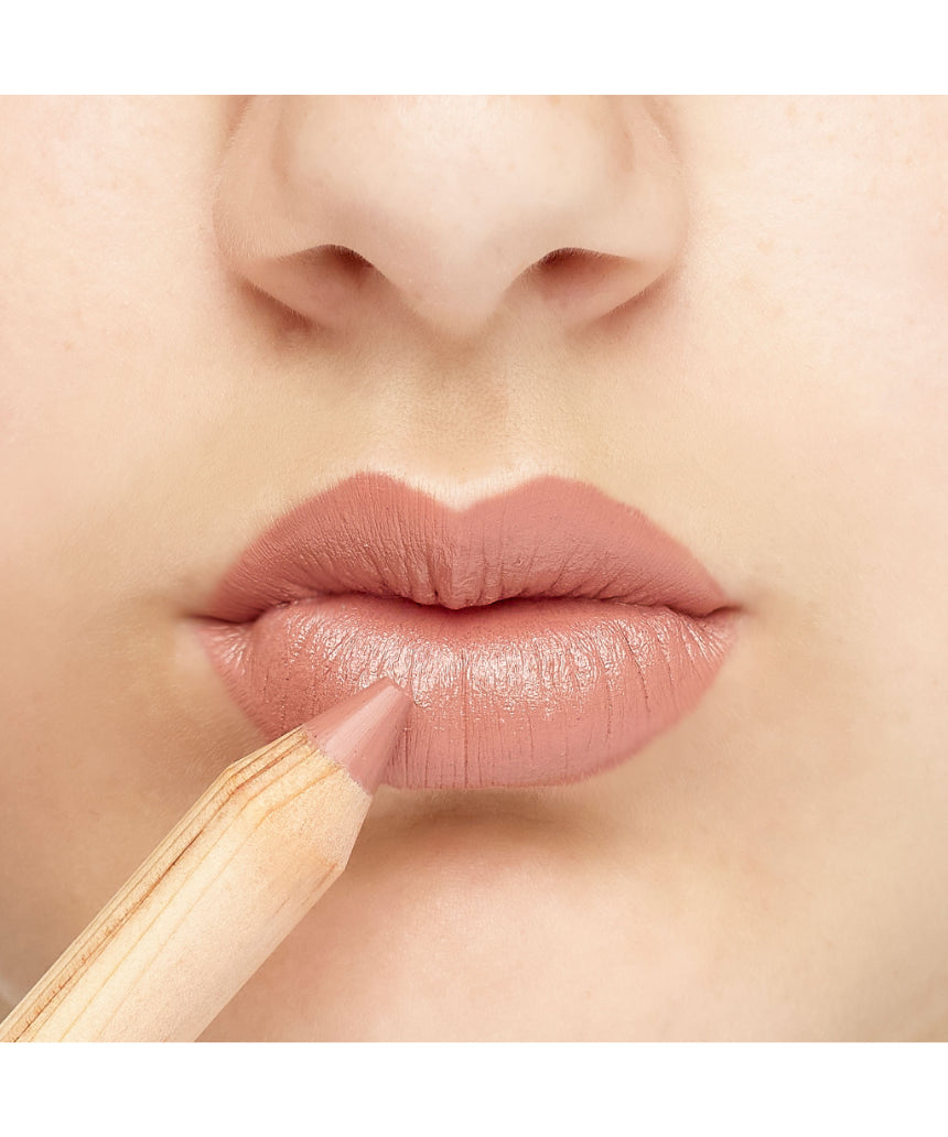 Luk Beautifood Natural Lipstick Crayon in Lychee Sorbet applied on lips, showcasing vibrant pinkish lip color.