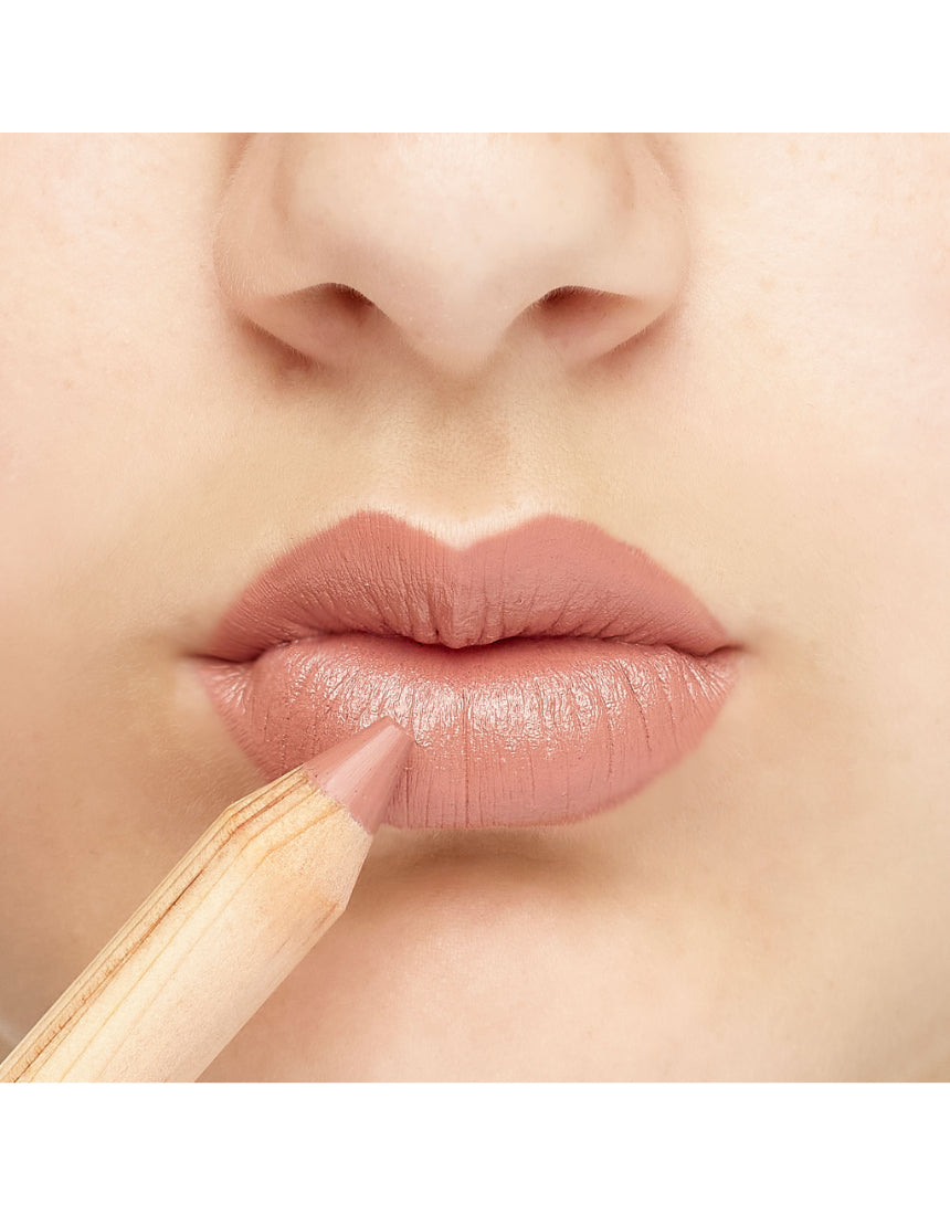 Luk Beautifood Natural Lipstick Crayon in Lychee Sorbet applied on lips, showcasing vibrant pinkish lip color.