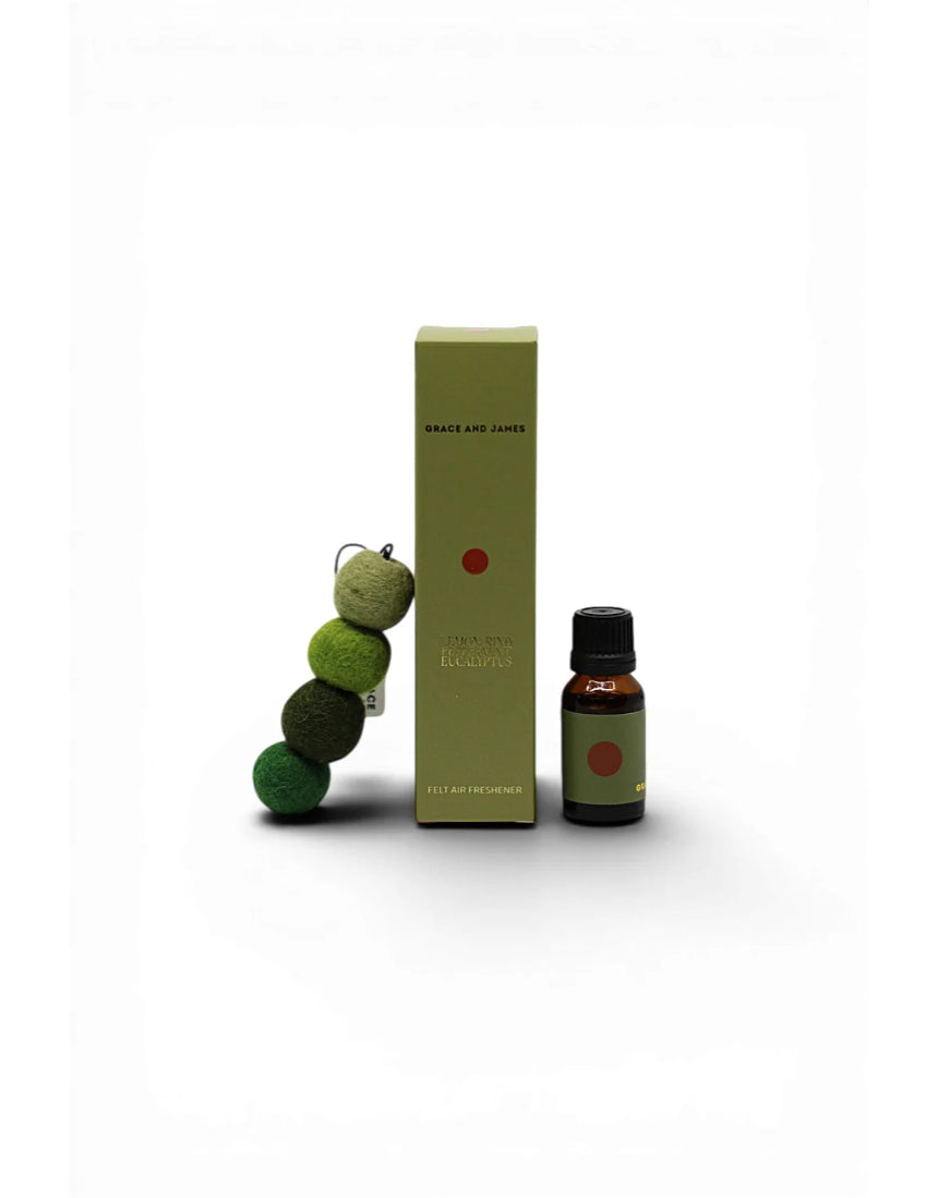 Grace & James Forager air freshener with lemon rind, peppermint, and eucalyptus scent in a sleek bottle.