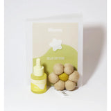 Grace & James Lime Leaf and Wild Fresia felt air freshener with vibrant lime and floral design.