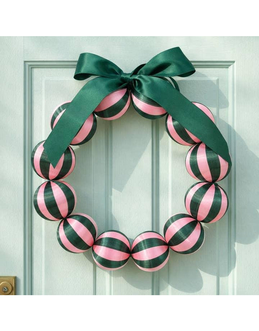 Little Fish Co silk ball Christmas wreath in green and pink with colorful silk balls and festive greenery.