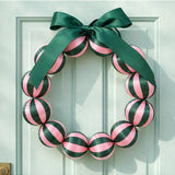 Little Fish Co silk ball Christmas wreath in green and pink with colorful silk balls and festive greenery.