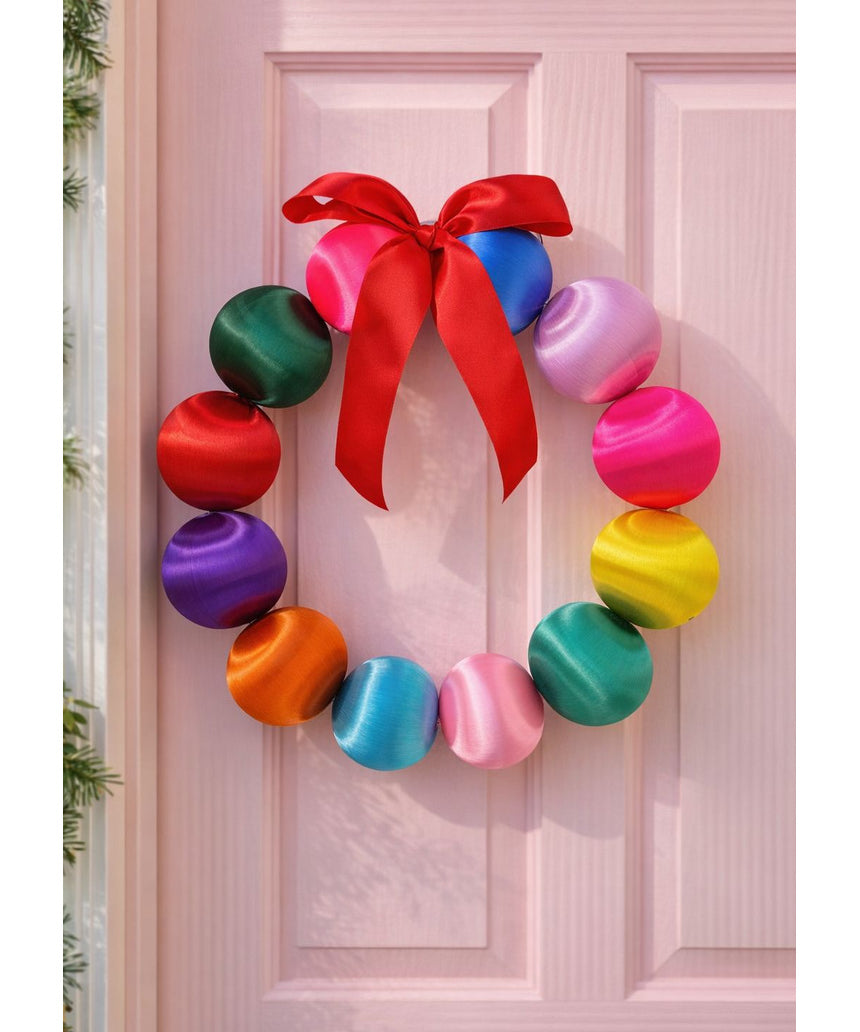 Colorful silk ball Christmas wreath by Little Fish Co featuring vibrant multi-colored silk balls for festive holiday decor.