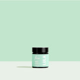 Lula Focus Balm essential oil in a small glass jar with natural ingredients, designed for aromatherapy and mental clarity.
