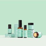 Lula Focus Balm essential oil in a small glass bottle with a black cap, labeled with Lula branding and product details.