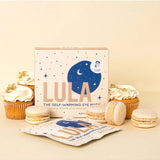 Lula self-warming vanilla eye mask on a person, showcasing a soft, comfortable fabric for relaxing eye comfort and sleep aid.