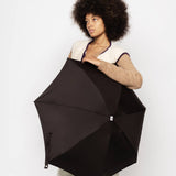 Anatole Edwige mini chocolate black umbrella with a compact design and classic handle, perfect for rainy days.