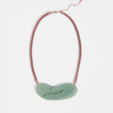 Elk Neve Necklace with jade green beads, featuring a delicate design and silver clasp, showcasing natural stone accents.