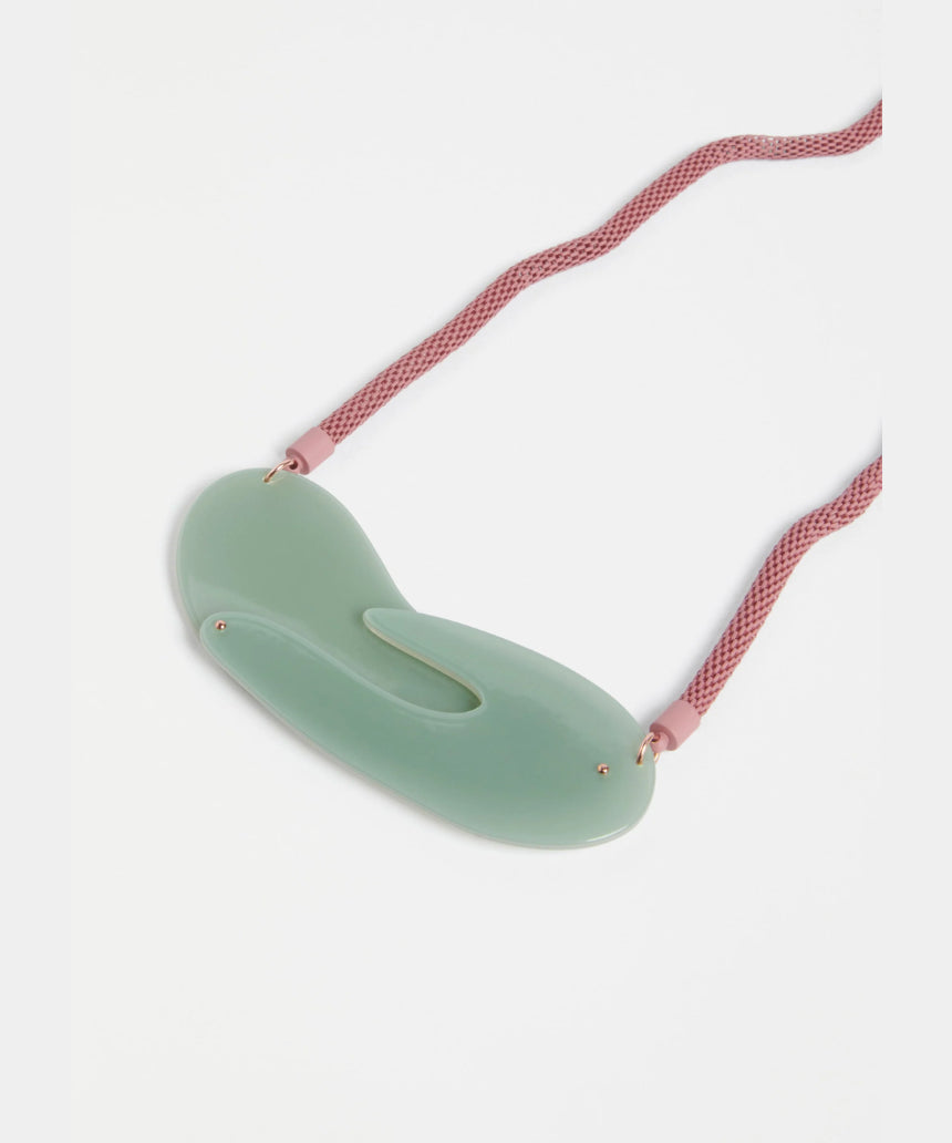 Elk Neve Jade Green Necklace featuring a vibrant green pendant and a delicate chain, stylish jewelry accessory.