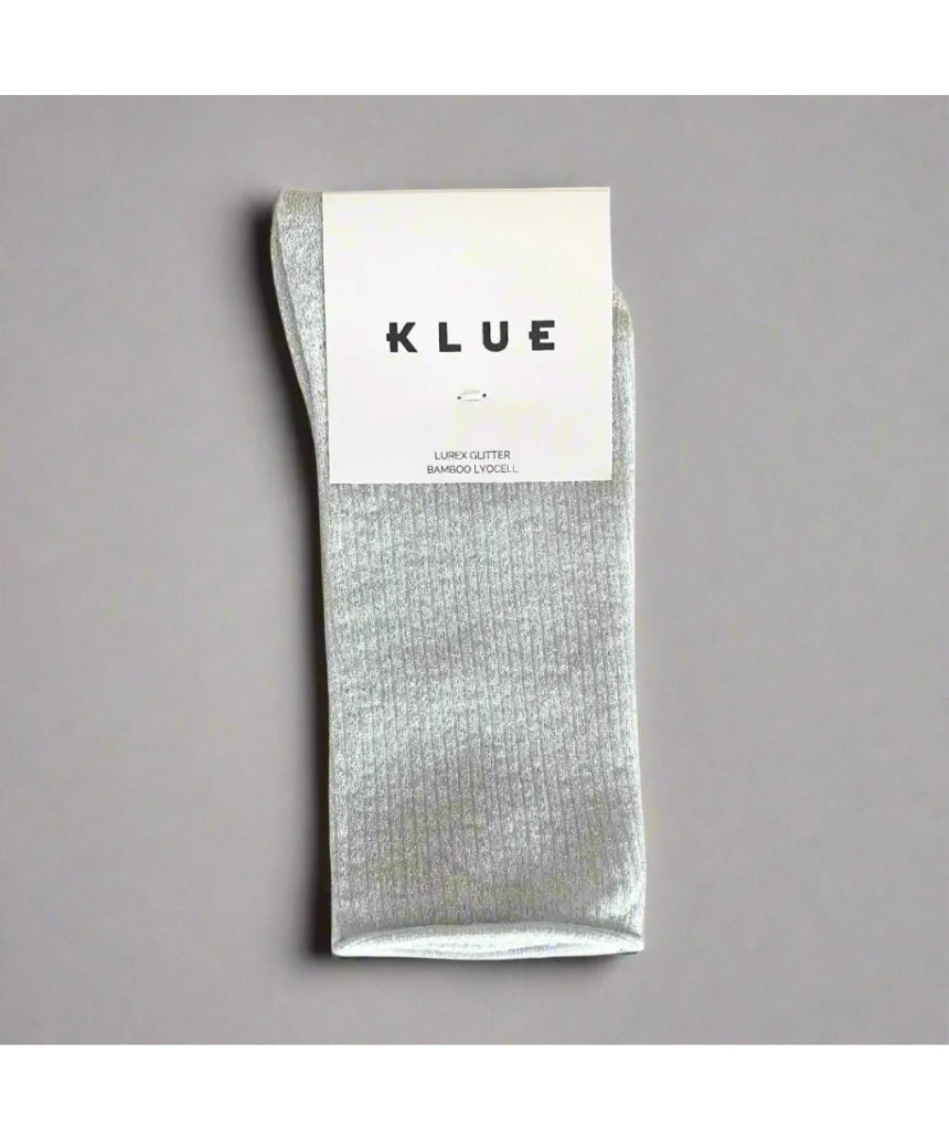 White Glitter Lurex Socks by Klue displayed in a packshot image, showcasing shiny, sparkly knit fabric and comfortable sock design.