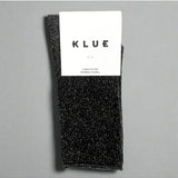Black glitter lurex socks by Klue, shown in packshot image with shiny, textured fabric and classic sock design.