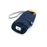 Anatole Colette folded navy blue micro-umbrella with timber handle