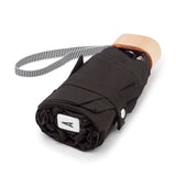 Black Anatole Edwige micro-umbrella with compact design, shown open with chocolate color fabric and no carrying case.