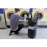 Suck UK punch laundry bag with bold graphic design, made of durable fabric for storing laundry in a stylish way.