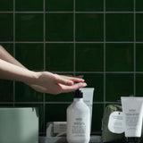 Salus Quintessential Skin Quartet hand wash set with four bottles featuring natural ingredients and elegant packaging.