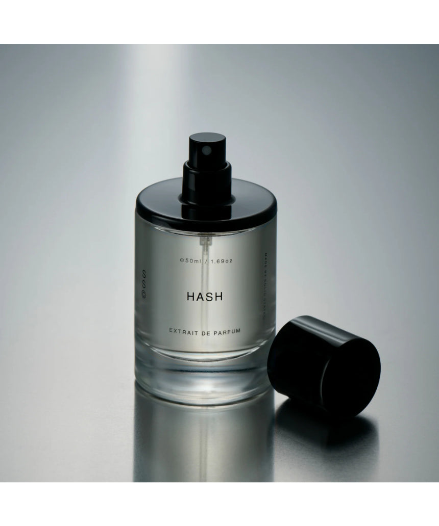 Solid State Hash Extrait de Parfum cologne bottle with sleek design and minimalist label, showcasing modern fragrance packaging.