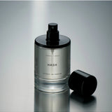Solid State Hash Extrait de Parfum cologne bottle with sleek design and minimalist label, showcasing modern fragrance packaging.