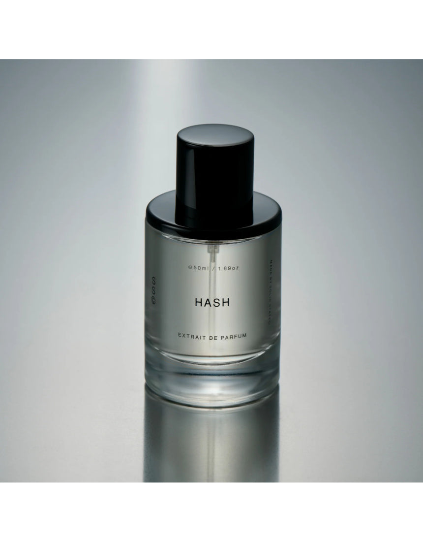 Solid State Hash Extrait de Parfum cologne bottle with sleek design and minimalist label, showcasing premium fragrance packaging.