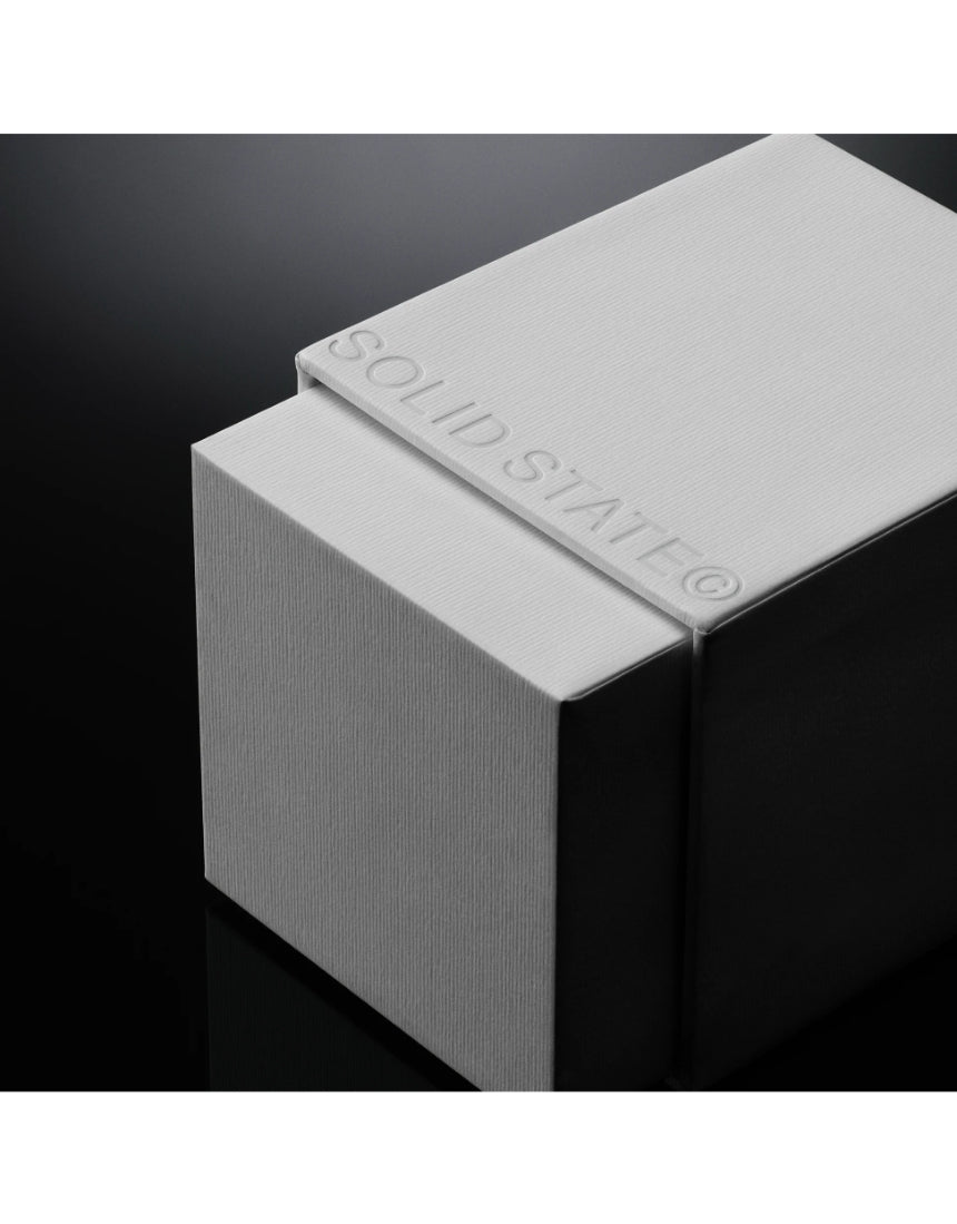 Solid State Hash Extrait de Parfum cologne bottle with sleek design and minimalist label, showcasing the luxurious fragrance.