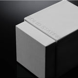 Solid State Hash Extrait de Parfum cologne bottle with sleek design and minimalist label, showcasing the luxurious fragrance.