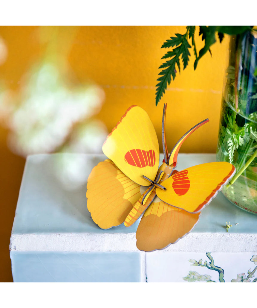 Yellow butterfly wall art from Studio Roof featuring a vibrant butterfly design for wall decor.