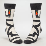 Blue Q men's crew socks featuring the "I Know A Shortcut" design with colorful patterns on soft fabric.