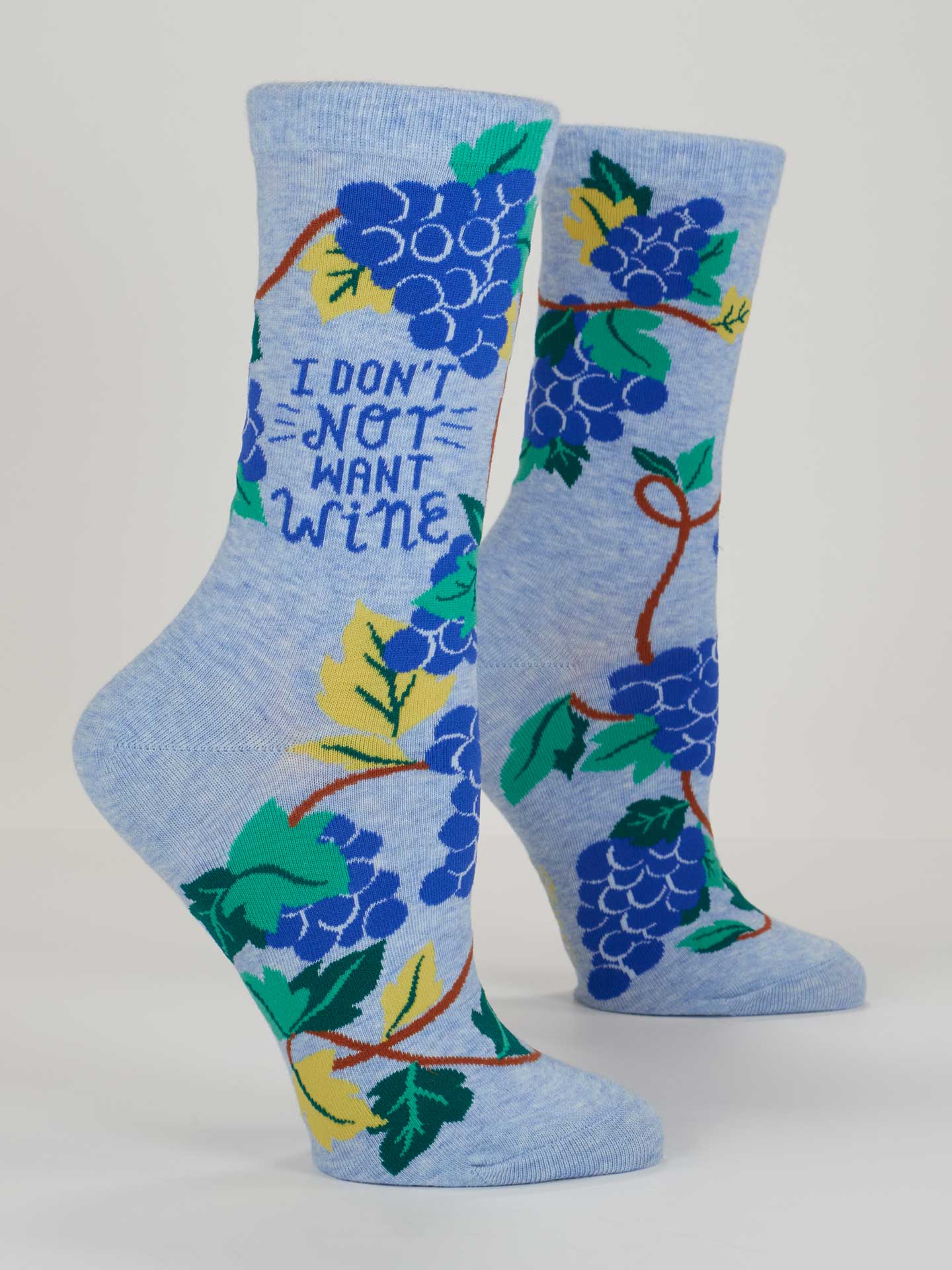 Blue Q ladies crew socks featuring a playful "Don't Not Want Wine" design, in vibrant blue with fun wine-themed graphics.