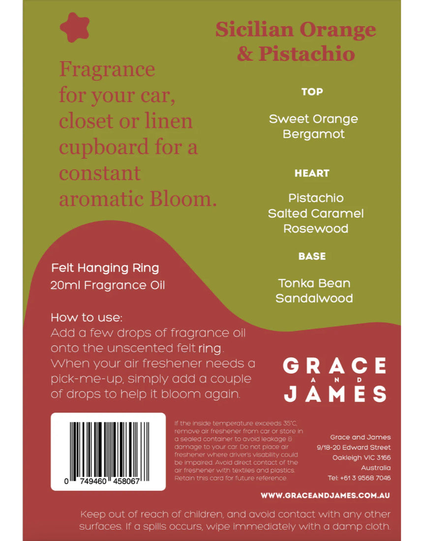 Orange and pistachio felt air freshener by Grace & James, featuring vibrant orange and green felt with a fresh scent.