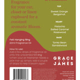 Orange and pistachio felt air freshener by Grace & James, featuring vibrant orange and green felt with a fresh scent.