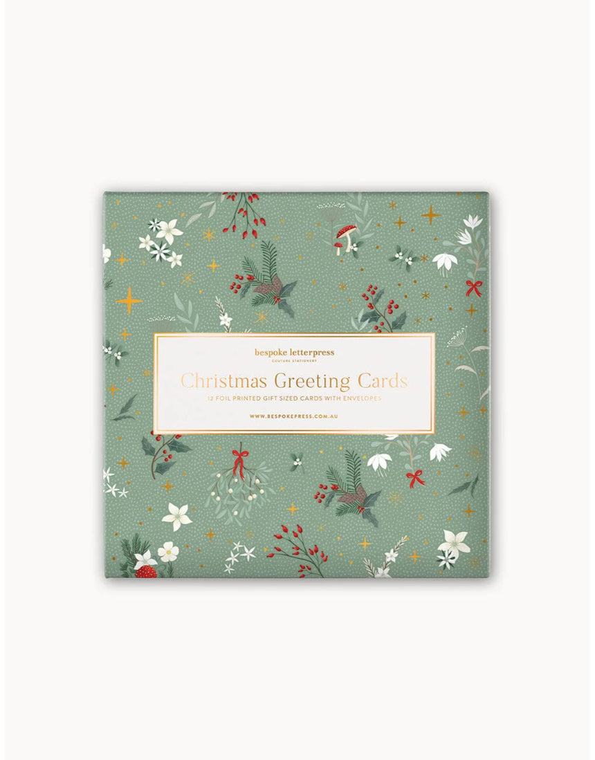 Bespoke Letterpress Christmas Village 12-pack square greeting card box set with festive holiday illustrations and elegant design.