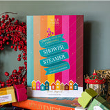 Wild Emery warm and bright Christmas shower steamer advent calendar with 12 festive shower bombs in colorful packaging