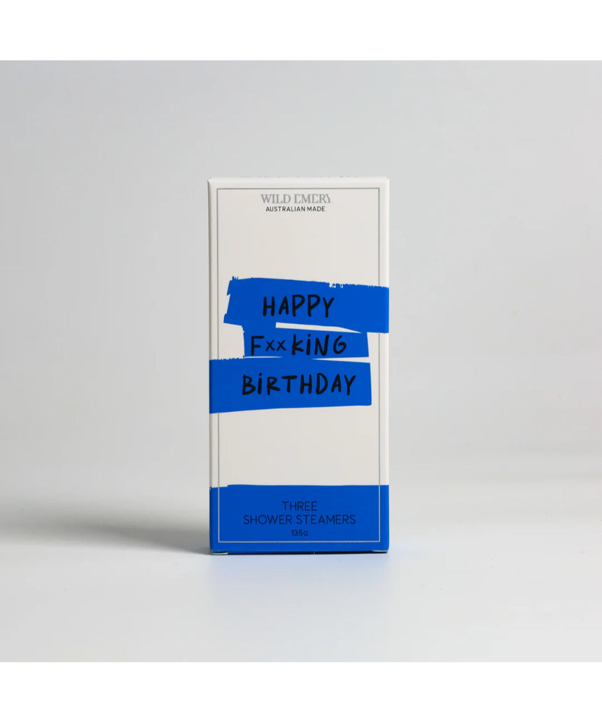 Wild Emery Happy F**king Birthday shower steamers in a 3-pack, featuring colorful bath and body product packaging.
