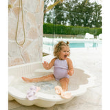 Winnie Parkes Maeve the Mermaid rubber teether in peach, featuring a playful mermaid design for infants.