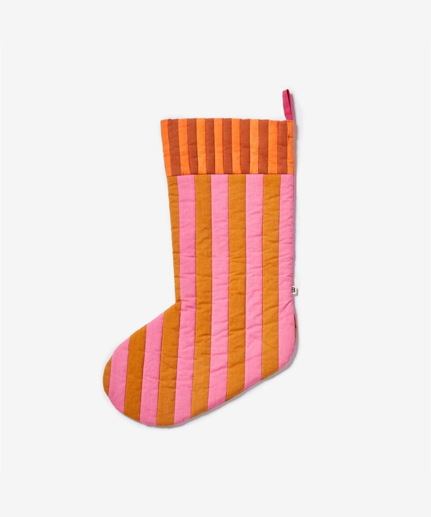Bonnie and Neil stripe tan pink Christmas stocking made of cotton, festive holiday decoration with a cozy design.