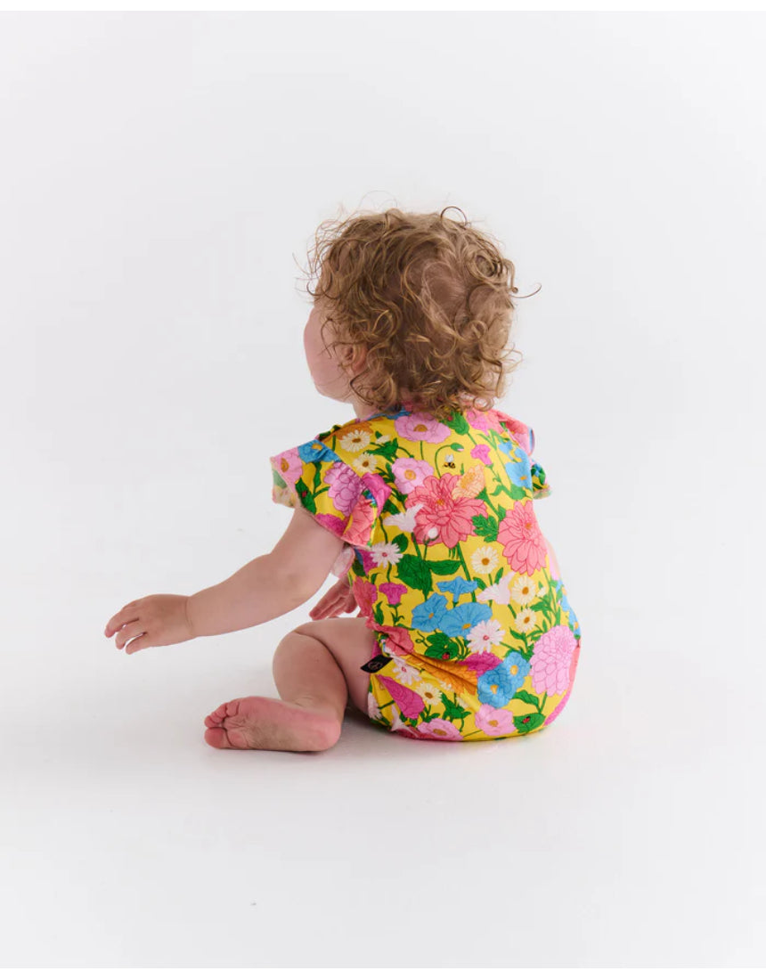 Kip & Co baby clothing, Follow the Sun short sleeve frill romper in bright, cheerful fabric with frill details for little ones.