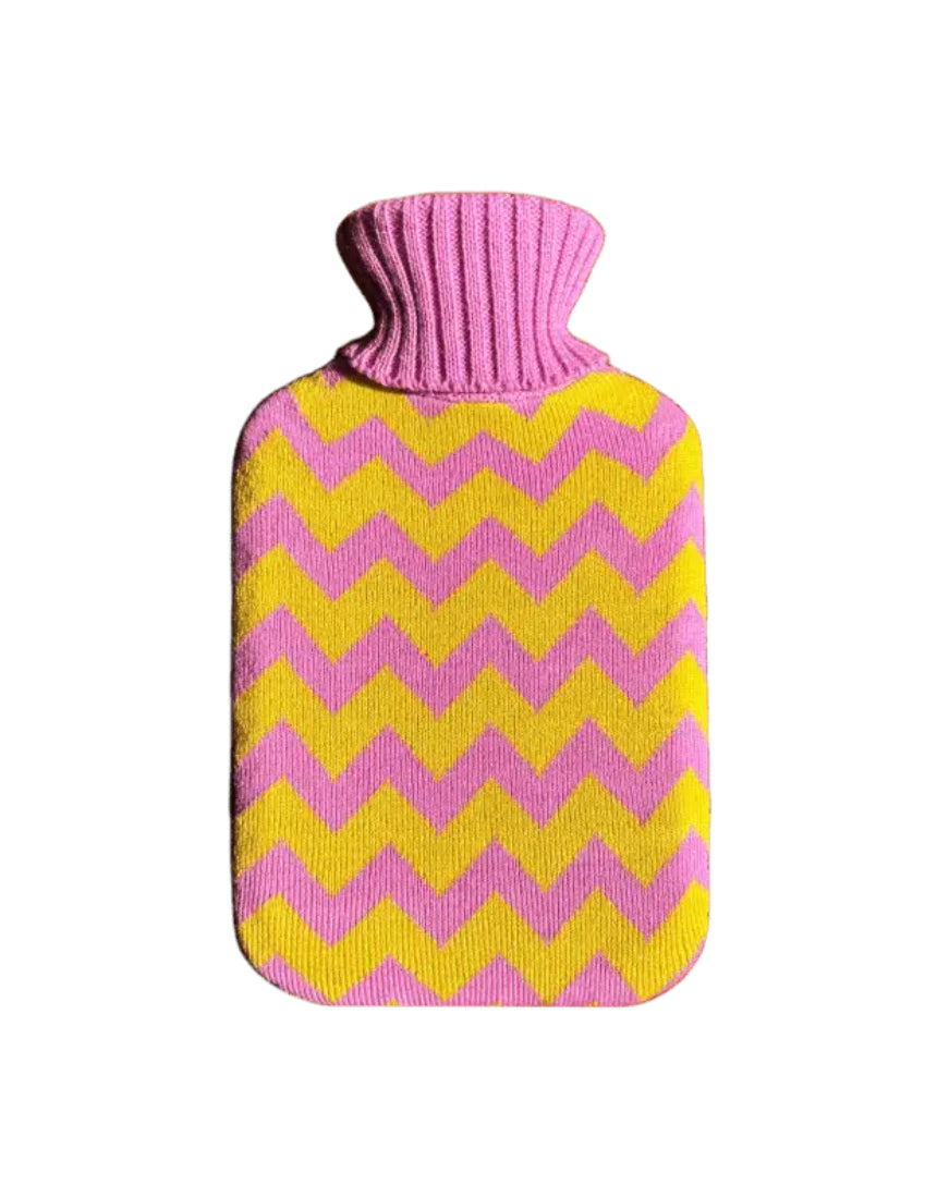 Casa Rolio hot water bottle with candy-colored cover, soft fabric design, and rounded shape for cozy warmth.