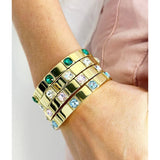 Gold Queenie bracelet by Mosk Melbourne with intricate chain design, shown on a neutral background in this product image.