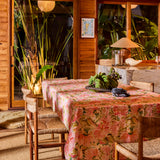 Kip & Co Warm Floral Breeze tablecloth with vibrant floral pattern, soft fabric, perfect for adding color to dining tables