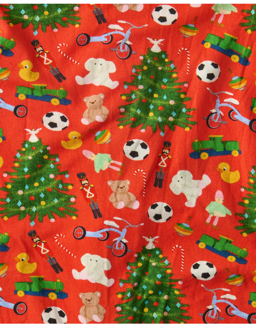 Kip & Co Christmas Toys baby romper with short sleeves, colorful festive print, soft cotton fabric, perfect for holiday wear.